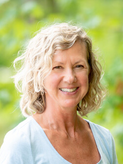 a portrait of Lisa Tidman, PTA, CLT, Yoga Instructor, Health Coach