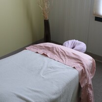 A photo of a massage therapy table at the PT360 Shelburne studio. 