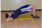 A photo of a man doing a body weight exercise